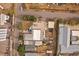 Aerial shot of a single-Gathering home with a large lot and ample parking space, revealing its overall layout at 5182 Thompson Ct, Denver, CO 80216
