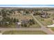 A well-kept property featuring an expansive yard, mature trees, and a long driveway in the community at 3342 Quail Ridge Cir, Parker, CO 80138