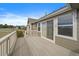 A well-maintained deck perfect for outdoor gatherings, featuring sliding glass door access at 3342 Quail Ridge Cir, Parker, CO 80138