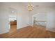 Formal dining room with chandelier and hardwood flooring at 3342 Quail Ridge Cir, Parker, CO 80138