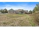 Inviting home with a covered front porch and brick accents, set on a sprawling lot at 3342 Quail Ridge Cir, Parker, CO 80138