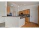 An open-concept kitchen with modern appliances, sleek countertops, and ample cabinet storage at 3342 Quail Ridge Cir, Parker, CO 80138