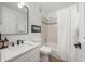 Well-maintained bathroom featuring a shower/tub combo, vanity, and framed artwork at 1495 Zamia Ave # 3, Boulder, CO 80304
