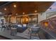 Outdoor patio with comfortable seating, a cozy fireplace, and outdoor dining area is perfect for entertaining at 700 Cheyenne St, Golden, CO 80401