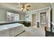 Bedroom features a window, access to a bathroom and includes modern design and ample space at 14878 E Aberdeen Ave, Centennial, CO 80016