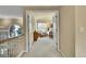 View from the hall into a bright bedroom with vaulted ceilings at 14878 E Aberdeen Ave, Centennial, CO 80016