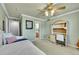 Bedroom with a white daybed, desk, and ensuite bathroom in a cozy and inviting space at 14878 E Aberdeen Ave, Centennial, CO 80016