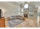 Bright living room with high ceilings, fireplace and lots of natural light at 14878 E Aberdeen Ave, Centennial, CO 80016