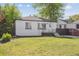 Charming home with a manicured lawn and updated exterior at 4624 S Lincoln St, Englewood, CO 80113