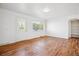 Inviting living room with stylish hardwood floors and bright, fresh paint at 4624 S Lincoln St, Englewood, CO 80113