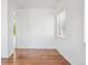 Bright living room showcasing hardwood floors, fresh paint, and natural light at 4624 S Lincoln St, Englewood, CO 80113