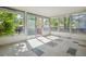 Bright sunroom with floor-to-ceiling windows providing beautiful views at 4624 S Lincoln St, Englewood, CO 80113