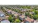 Aerial view of a neighborhood featuring well-maintained homes, green spaces, and a sense of community at 15353 E 98Th Pl, Commerce City, CO 80022