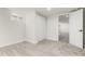 A finished basement bedroom featuring neutral carpet, a closet, and an open doorway at 6699 S Pennsylvania St, Centennial, CO 80121