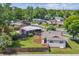 Charming home featuring a spacious backyard, mature trees, and a fenced-in yard at 1420 S Leyden St, Denver, CO 80224