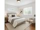 Cozy bedroom with soft bedding and a tranquil atmosphere at 1420 S Leyden St, Denver, CO 80224