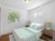 Inviting bedroom offers a comfortable bed and ample natural light at 1420 S Leyden St, Denver, CO 80224