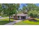 Charming single-story home with a well-maintained lawn and mature trees in a quiet neighborhood at 1420 S Leyden St, Denver, CO 80224
