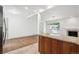Bright kitchen area showcasing granite countertops, tile floors, and stainless steel appliances at 1420 S Leyden St, Denver, CO 80224