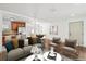 Bright living room with open layout to dining area and view of kitchen at 1420 S Leyden St, Denver, CO 80224