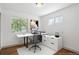 Home office with modern desk and storage, plus great natural light at 1420 S Leyden St, Denver, CO 80224