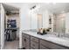 Bathroom boasts dual sinks, granite counters, and a walk-in closet at 20000 E 40Th Ave # 4, Denver, CO 80249