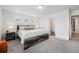 Spacious main bedroom features neutral paint and a serene atmosphere at 20000 E 40Th Ave # 4, Denver, CO 80249
