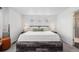 Comfortable main bedroom with a statement headboard and a calming ambiance at 20000 E 40Th Ave # 4, Denver, CO 80249