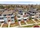 Aerial view of modern homes with solar panels, landscaped front yards, and neighborhood street views at 4535 W 50Th Ave, Denver, CO 80212