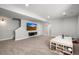Spacious finished basement with large TV and play area, perfect for Gathering fun at 4535 W 50Th Ave, Denver, CO 80212
