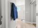 Modern bathroom featuring tiled floors, modern fixtures, and a glass-enclosed shower at 4535 W 50Th Ave, Denver, CO 80212