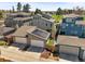 Exterior aerial view of modern homes with solar panels and attached garages at 4535 W 50Th Ave, Denver, CO 80212