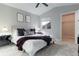 Spacious bedroom with a king-size bed and walk-in closet at 4538 Copeland Loop # 202, Highlands Ranch, CO 80126