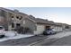 Exterior view of building with attached garages at 4538 Copeland Loop # 202, Highlands Ranch, CO 80126