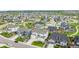 Sprawling neighborhood featuring numerous homes, green spaces, and community parks at 6679 Kenzie Cir, Castle Pines, CO 80108