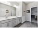 Modern bathroom with double sinks, ample cabinet space, and contemporary finishes at 6679 Kenzie Cir, Castle Pines, CO 80108