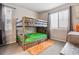 Playful ' room with bunk beds, a window, and carpeted floors at 6679 Kenzie Cir, Castle Pines, CO 80108