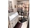 Well-maintained bathroom with a stylish shower curtain, vanity, and toilet at 3626 S Granby Way # L03, Aurora, CO 80014