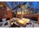 Inviting backyard patio with fire pit and seating area, perfect for winter gatherings at 1433 E 7Th Ave, Denver, CO 80218