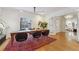 Dining room with hardwood floors, a rustic table, and black leather chairs at 1433 E 7Th Ave, Denver, CO 80218