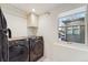 Bright laundry room with modern washer and dryer at 1433 E 7Th Ave, Denver, CO 80218