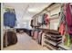 Large walk-in closet with ample shelving and hanging space at 1433 E 7Th Ave, Denver, CO 80218