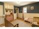 Bright bedroom with hardwood floors, storage, and a warm, inviting ambiance at 2795 Se Grapevine Rd, Idledale, CO 80453