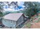 Charming home exterior with views of the nearby landscape and partial sun exposure at 2795 Se Grapevine Rd, Idledale, CO 80453