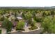 Aerial view of a charming neighborhood showcasing well-maintained homes, lush greenery, and mature trees at 8140 S Storm King Peak, Littleton, CO 80127