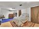 Basement bedroom with dresser and area rug at 4705 Upham St, Wheat Ridge, CO 80033