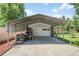 Detached carport featuring open-air design, providing ample space for vehicle parking and outdoor storage at 4705 Upham St, Wheat Ridge, CO 80033