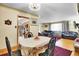 Inviting living room featuring hardwood floors and a decorative chandelier at 4705 Upham St, Wheat Ridge, CO 80033