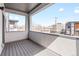 Relax on this balcony overlooking the neighborhood, offering privacy and outdoor living space at 1733 Irving St # 101, Denver, CO 80204