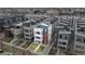 Modern townhome with a sleek design, private yard, and inviting curb appeal at 1733 Irving St # 101, Denver, CO 80204